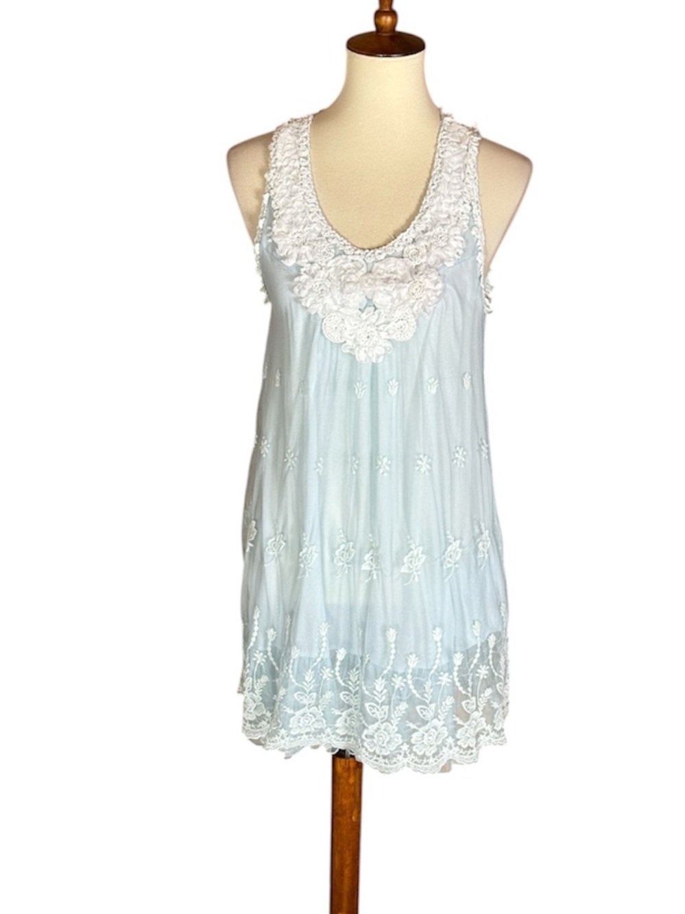 Pretty Angel light blue baby doll dress with flower neckline and mesh overlay